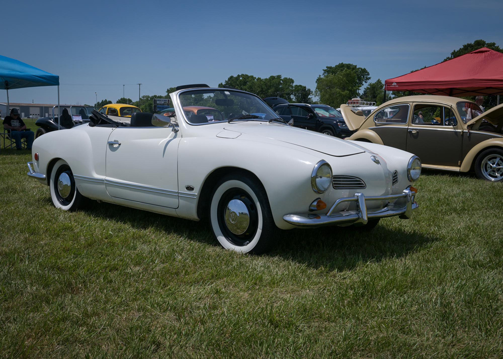 Karmann Ghia parked beside a standard Beetle